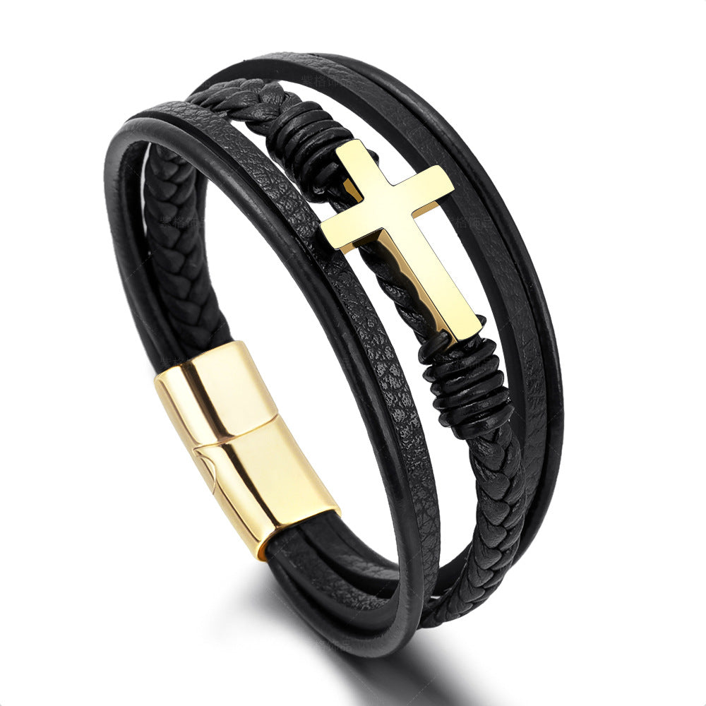 Solid steel cross bracelet with matte black finish on rugged leather.