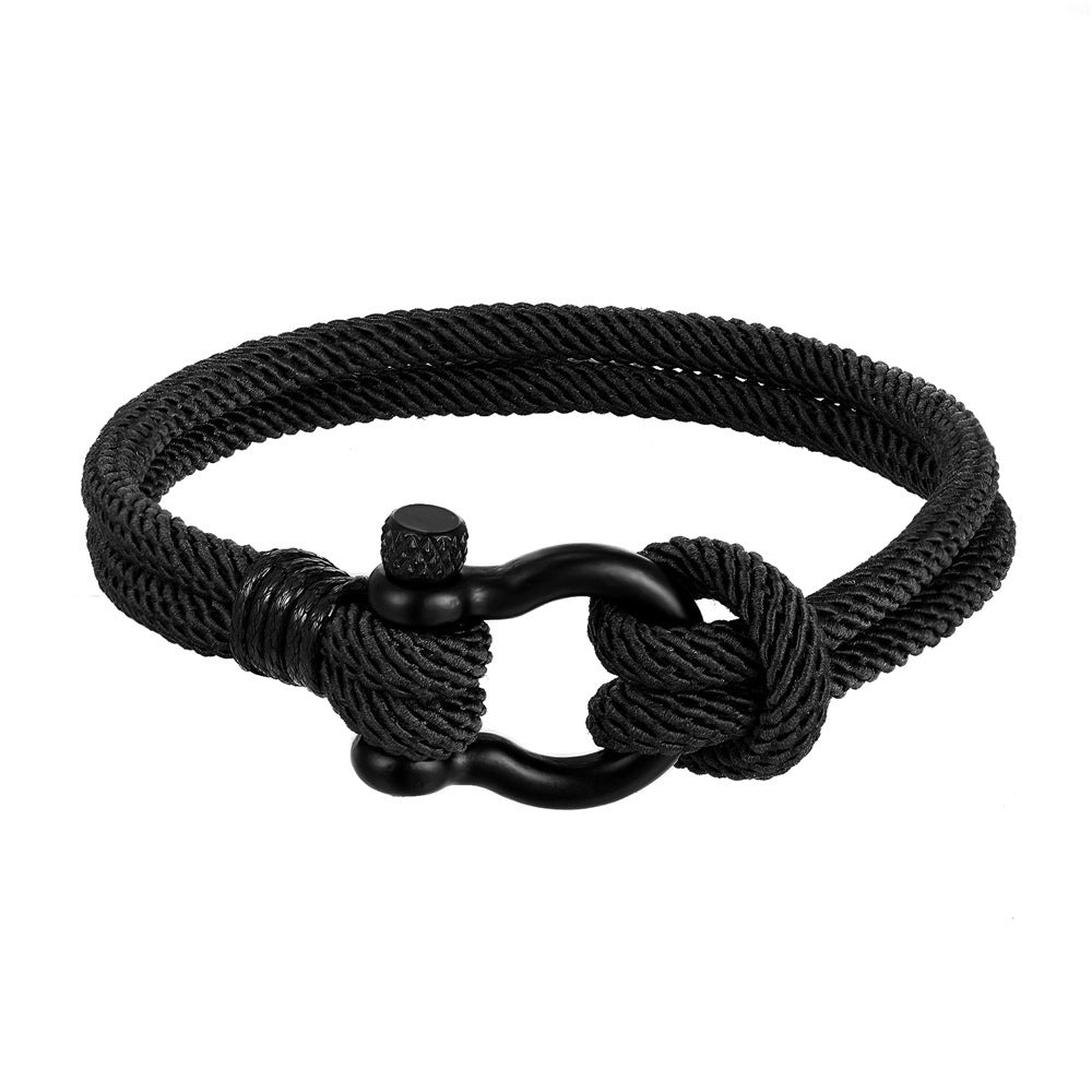 Voyager’s Rope Cuff on sun-bleached wood, showing adjustable knot detail.