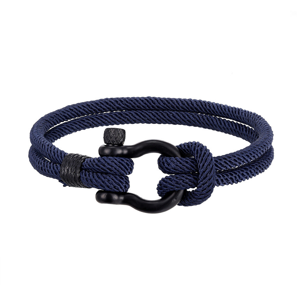 Voyager’s Rope Cuff on sun-bleached wood, showing adjustable knot detail.