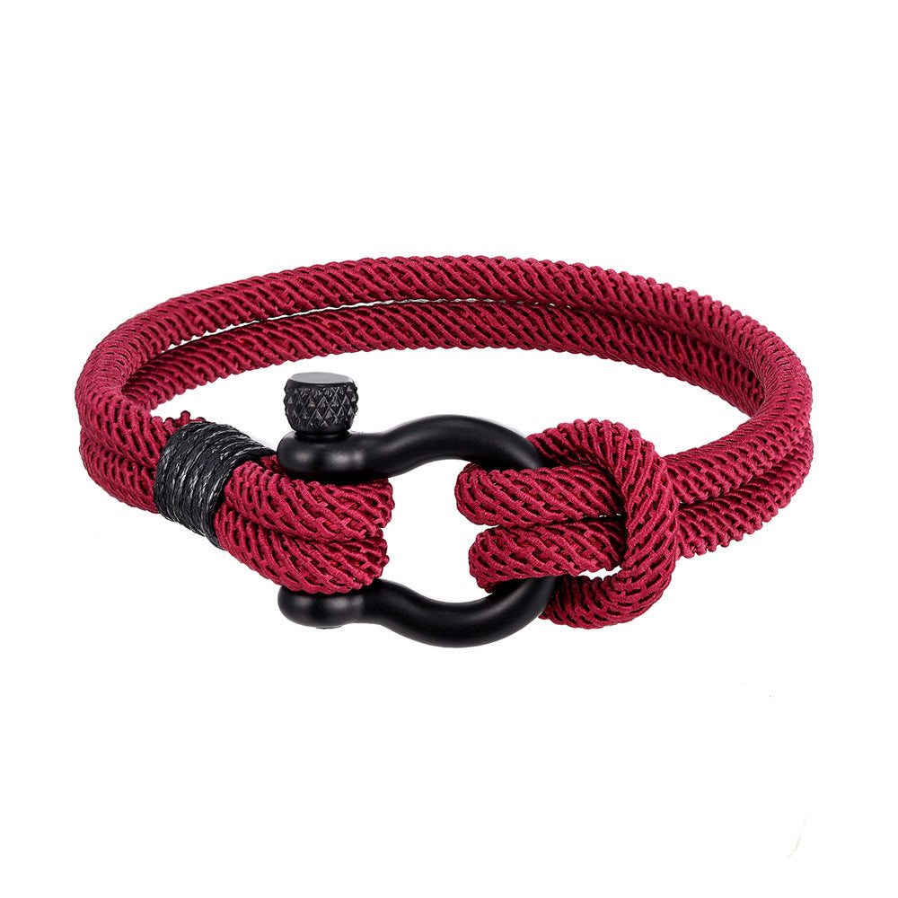Close-up of braided Milan rope texture, worn by salt and sun.
